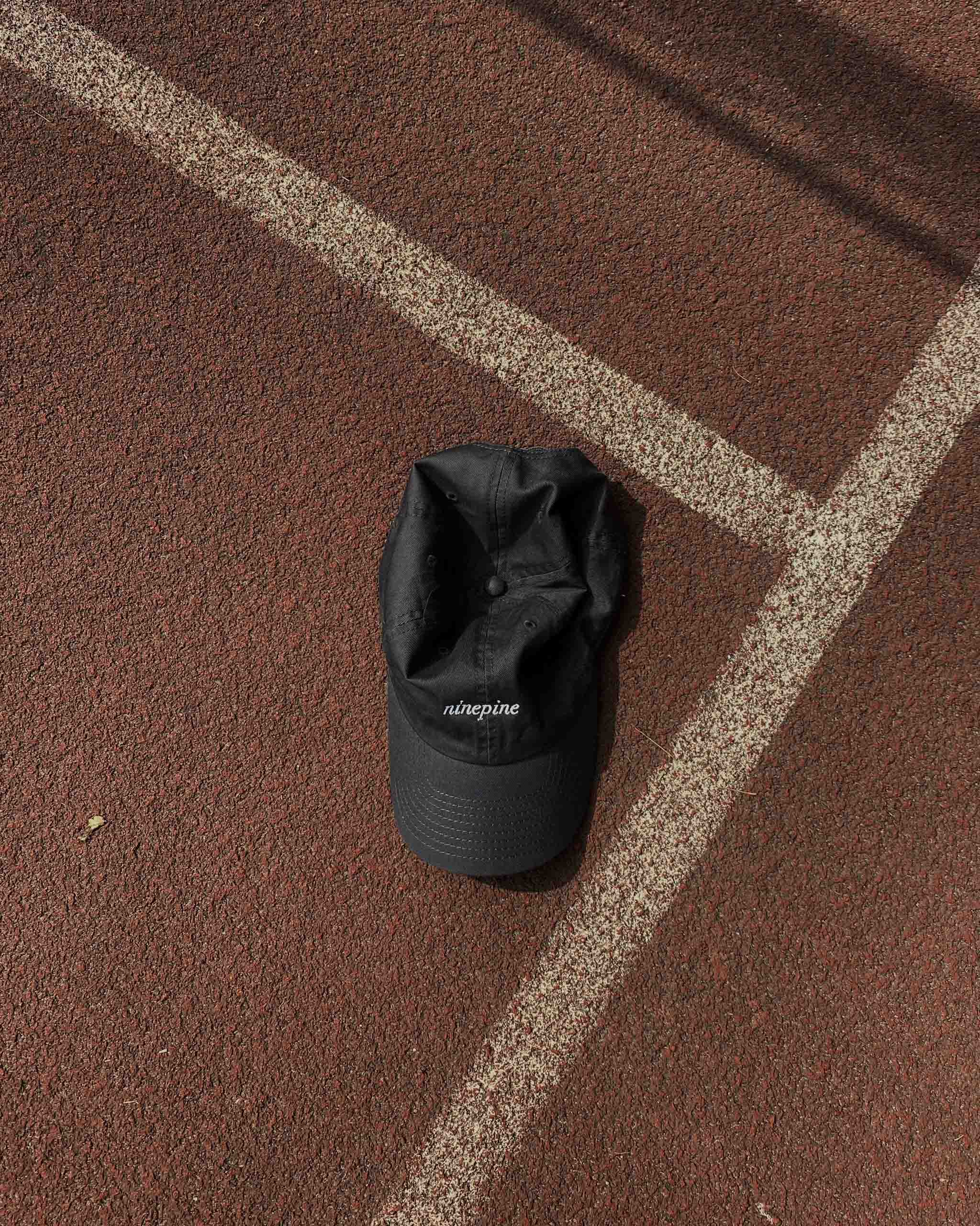 Wet ninepine cap on running track